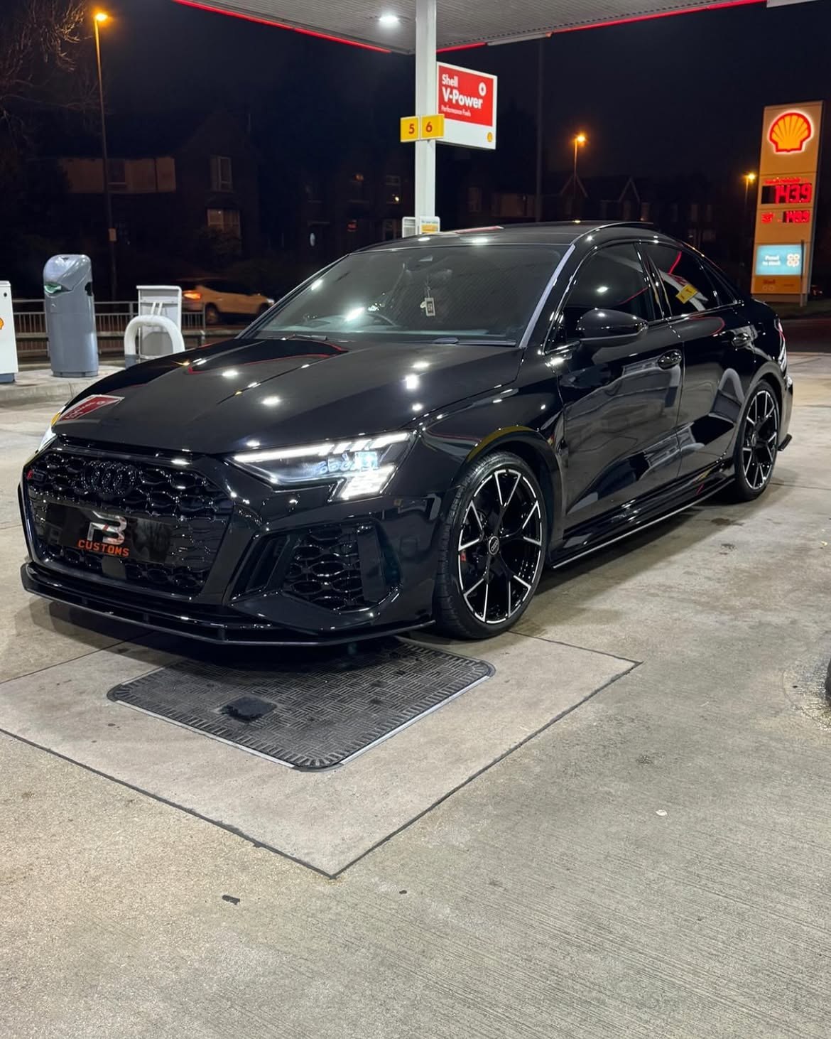 Black Audi photographed at night